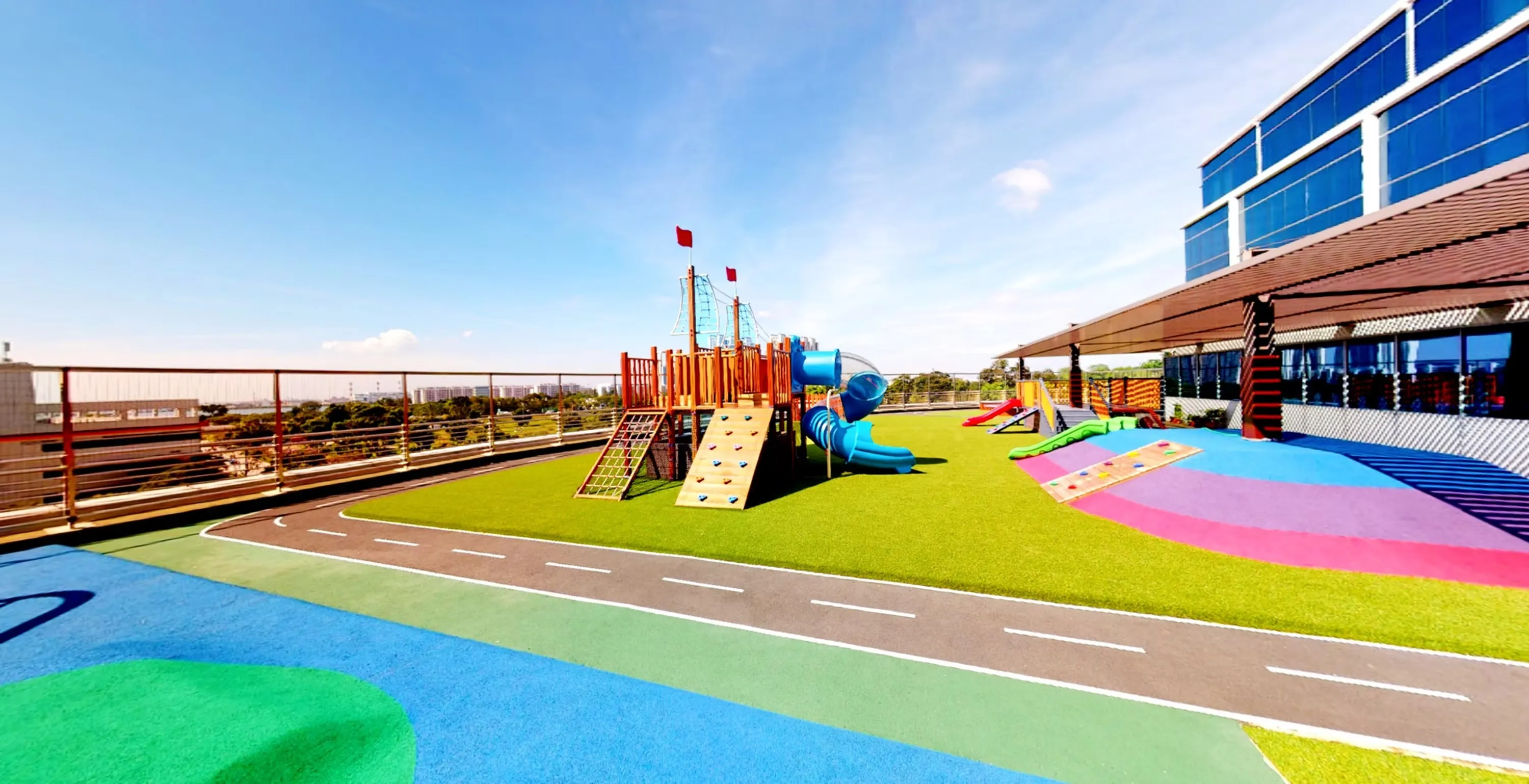 Rooftop outdoor playground with cycling track