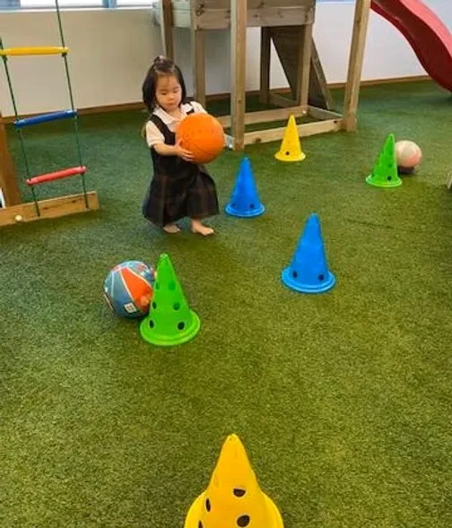 A child on a Kidnastics obstacle course