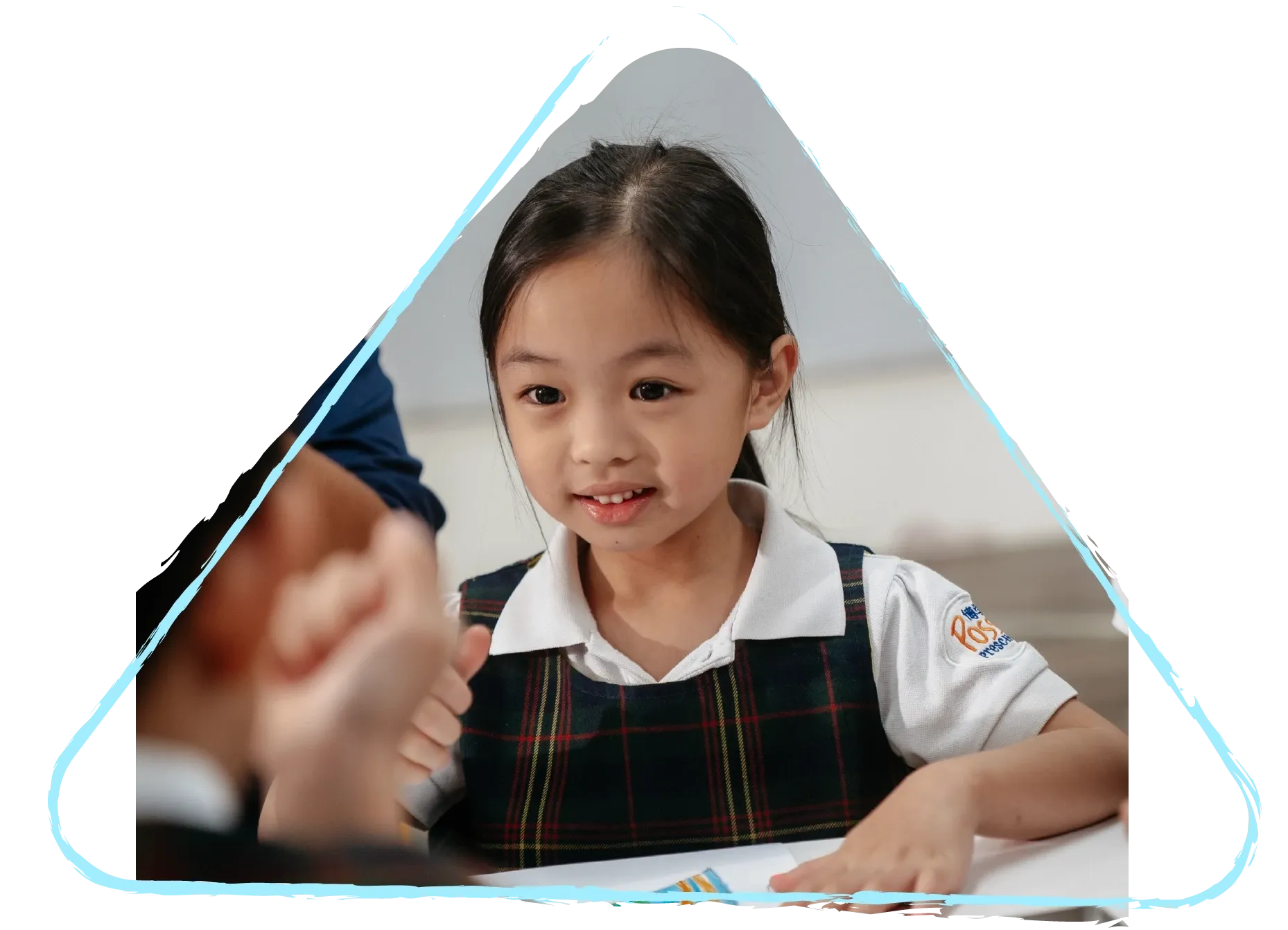 A Kindergarten 1 child writing