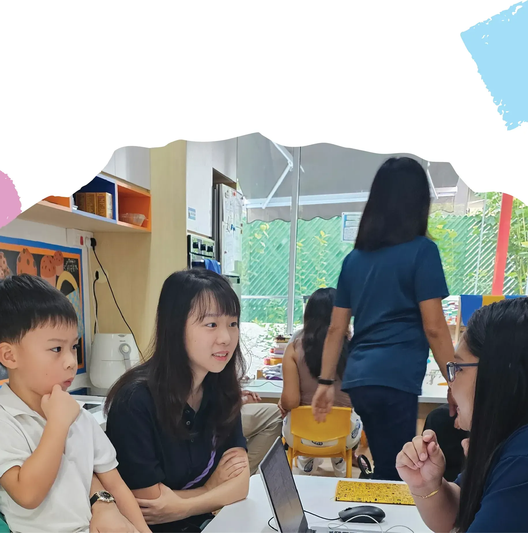 Parents and their child talking with Posso teachers